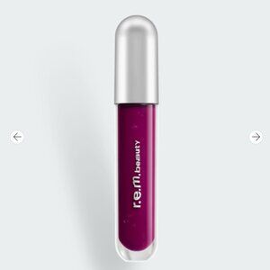 R.E.M. beauty essential drip glossy balm - shade Juice Box (deep, punchy berry)